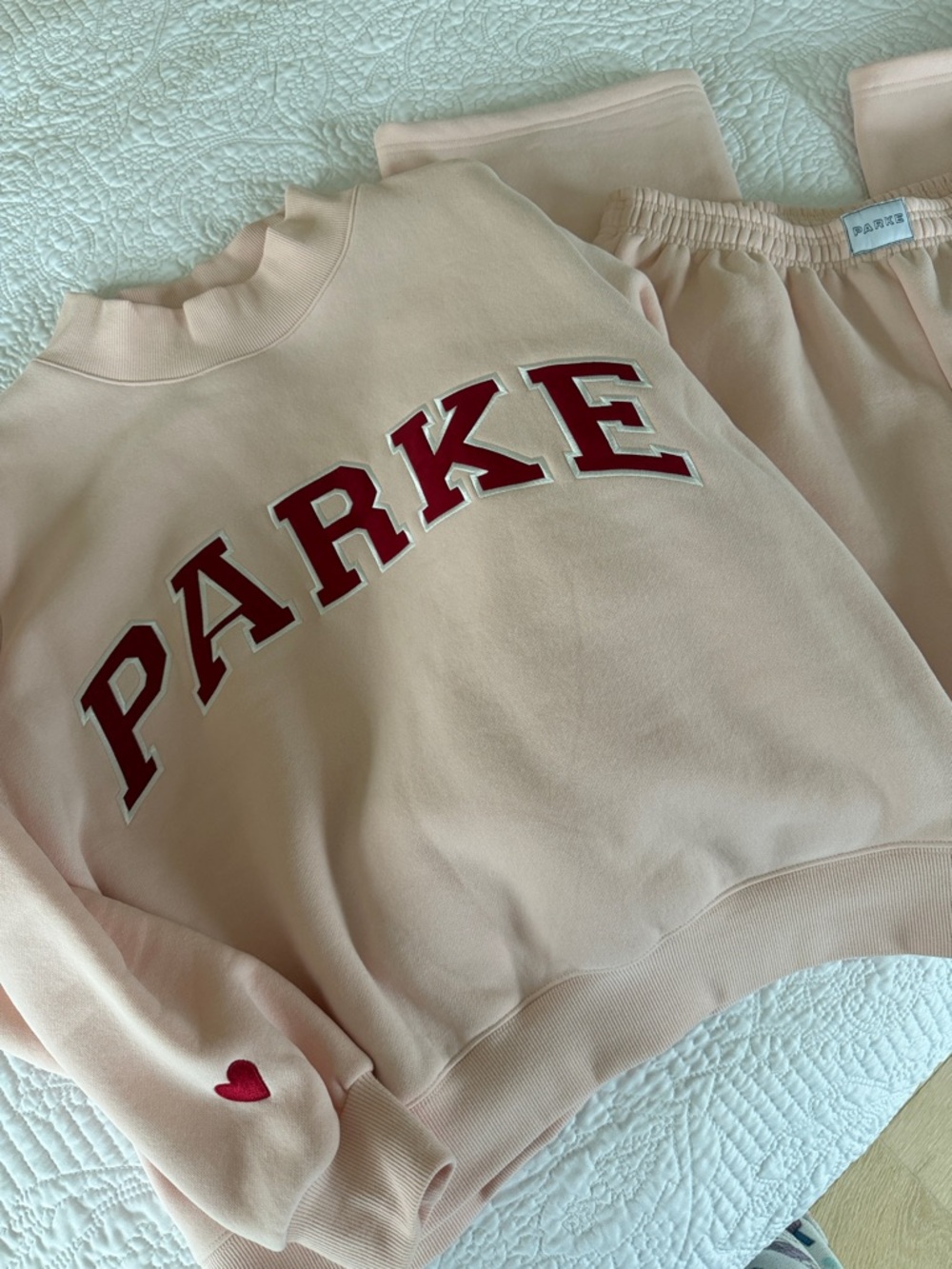 PARKE Pale Pink Sweatshirt with Red Lettering